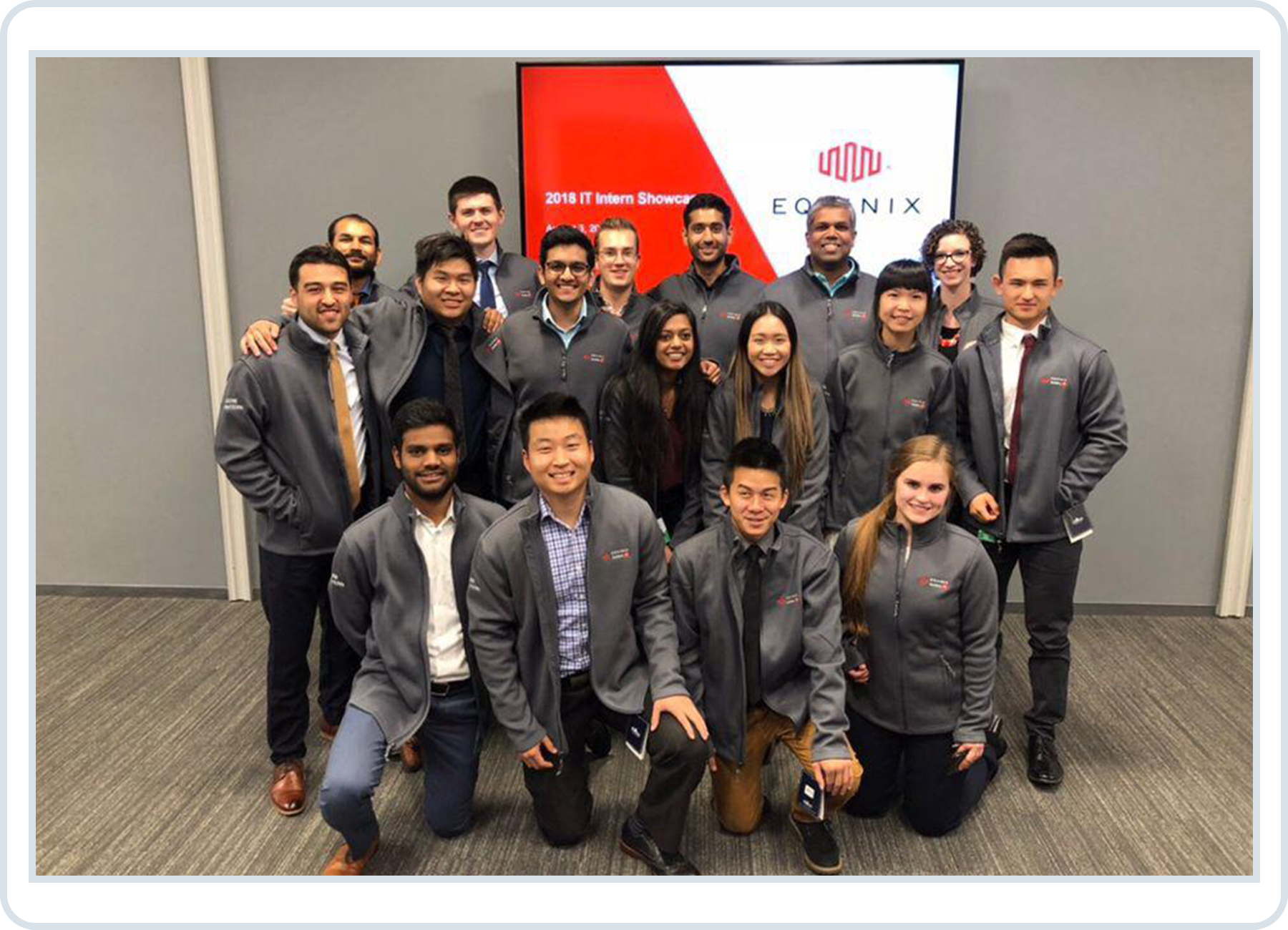 a photo of 15 interns with CIO, Milind Wagle, at the final presentation